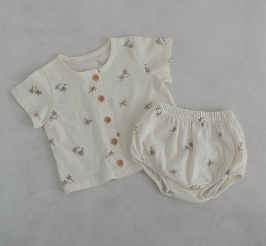 light ivroy colored cotton baby tshirt and bloomer set adorned with wooden buttons and palm tree decals