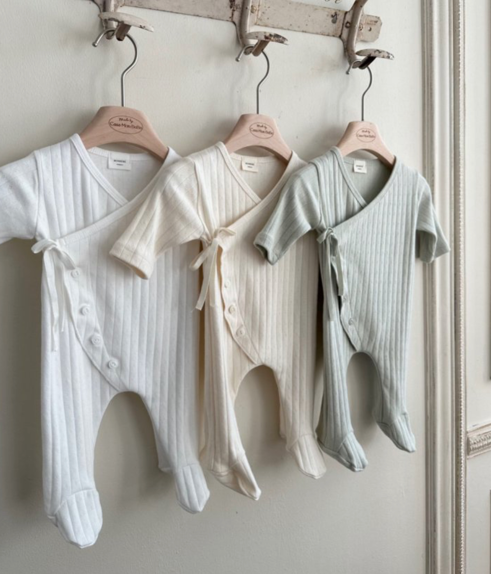 High quality newborn and baby garments and goods in fun, timeless and neutral colors and patterns. Cotton and gender neutral baby onesies, baby tops, baby bottoms, baby home goods and baby shower and baby gifts from best Scandinavian and South Korean brands with fast delivery and gift wrapping delivered in the US