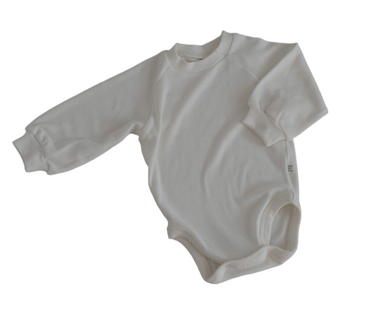 High quality newborn and baby garments and goods in fun, timeless and neutral colors and patterns. Cotton and gender neutral baby onesies, baby tops, baby bottoms, baby home goods and baby shower and baby gifts from best Scandinavian and South Korean brands with fast delivery and gift wrapping delivered in the US